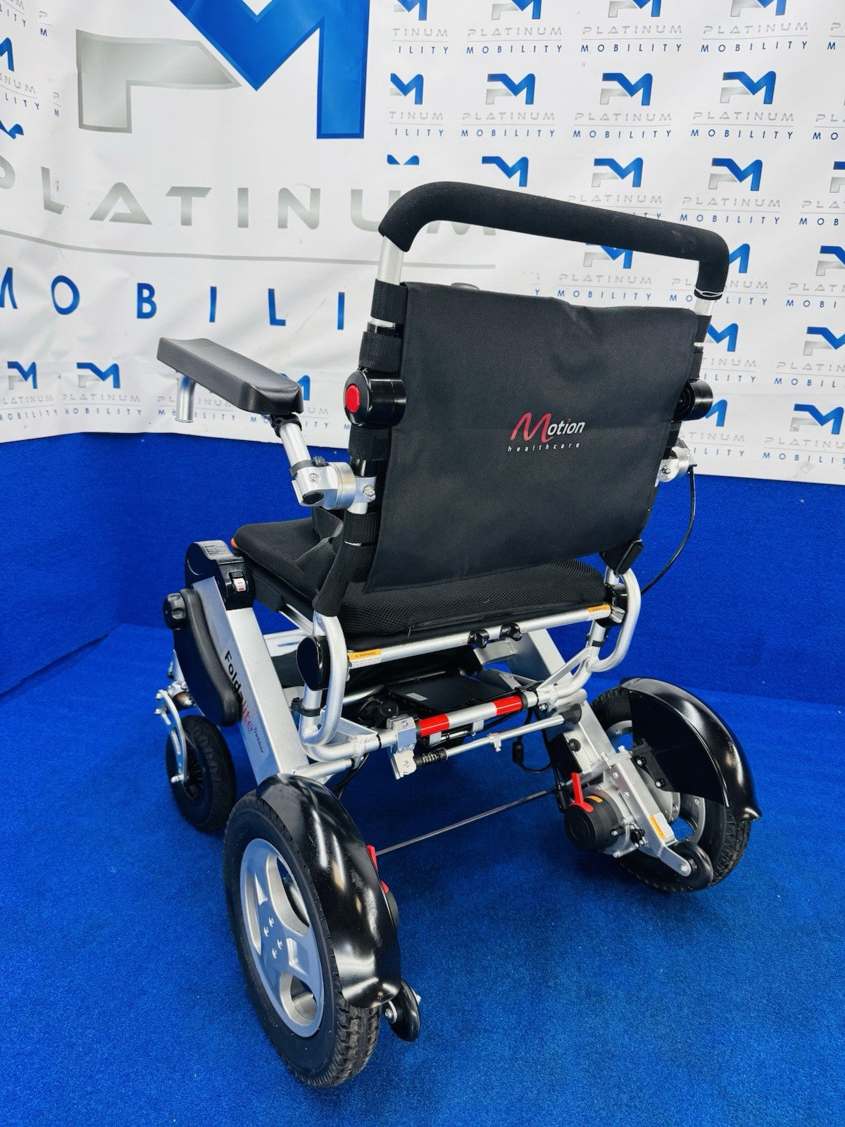 Motion Healthcare 4mph Foldalite Trekker Folding Electric Wheelchair 1371