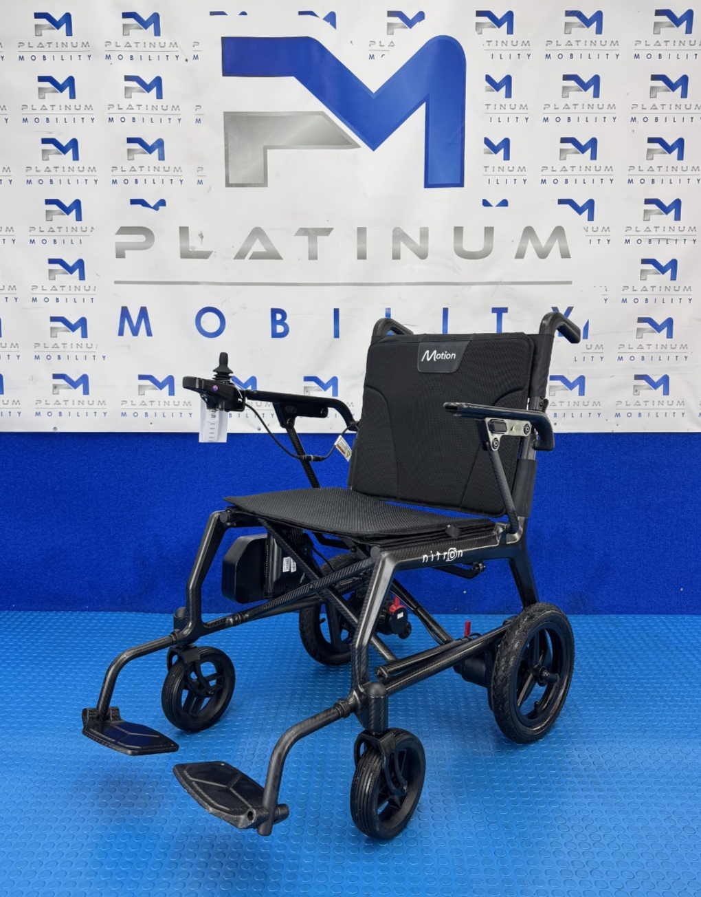 Carbon Fibre Ultra Lightweight Powerchair 12.8kg. Motion Nitron Powerchair 2336